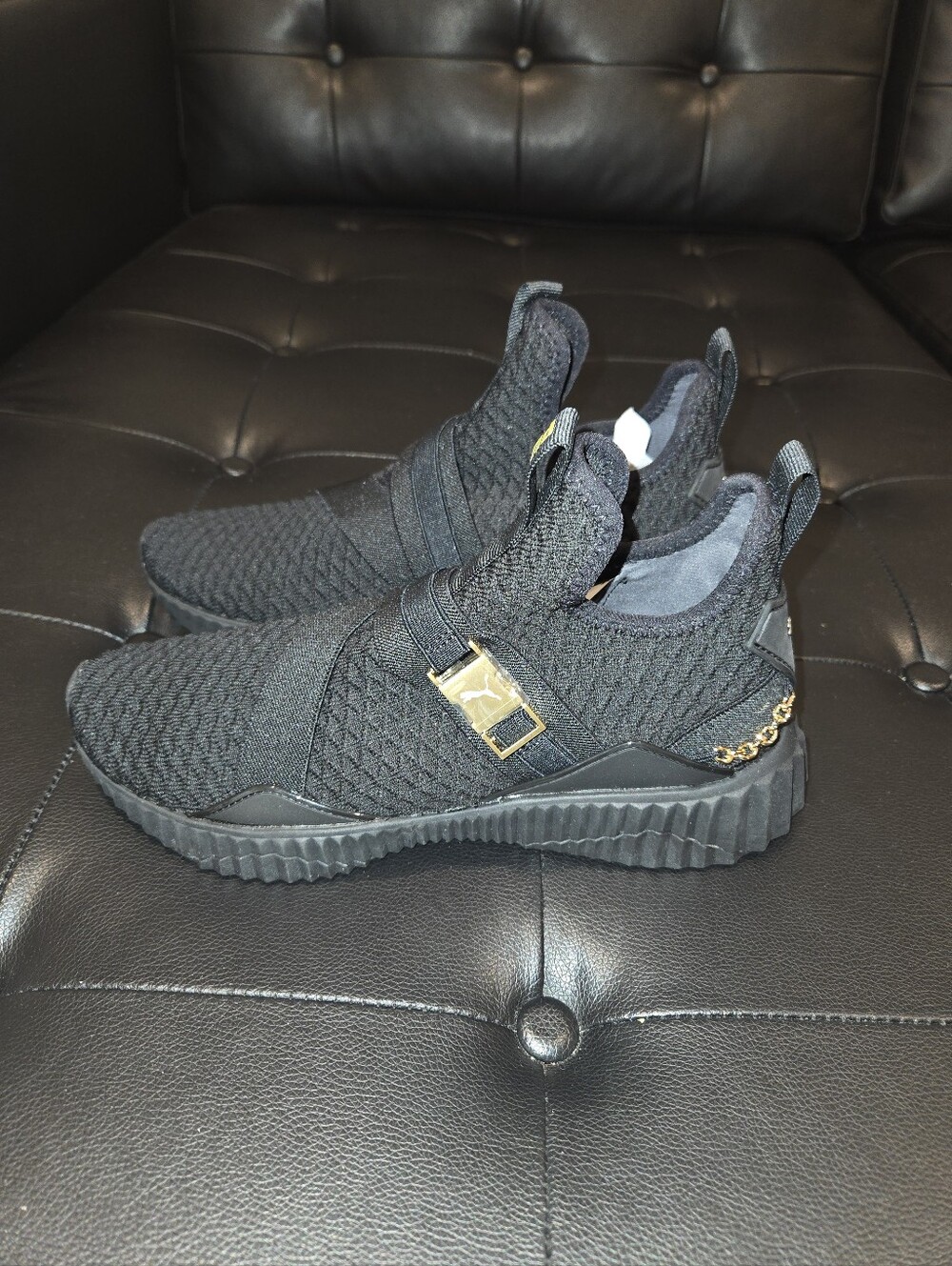 Puma Black Knit Slip-On Trainers with Gold Accents - Picture 4 of 7